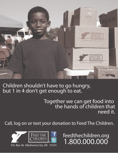 A child standing in front of boxes at an event in an old web ad for Feed the Children